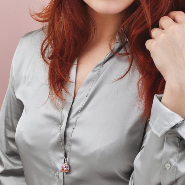 Collana con campanella portafortuna fucsia e arancione