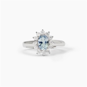Anello in argento con acquamarina sintetica ovale e zirconi