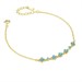 Bracciale dorato con con fiori definiti da zirconi blu