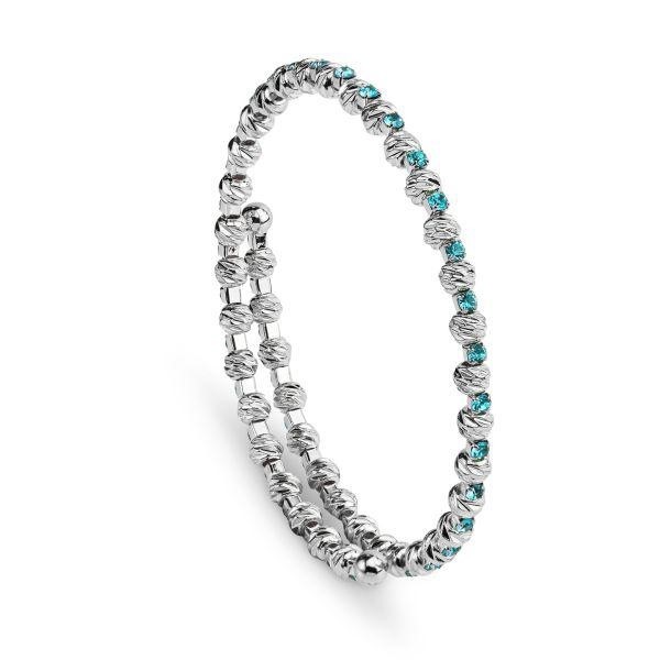 Bracciale a molla con boules lavorate e cristalli azzurri