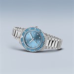 Argento Spazzolato con Fondo Blu Oceano